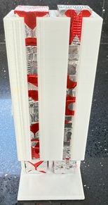 A 3D printed Oxo cube stacker, with two columns of cubes.